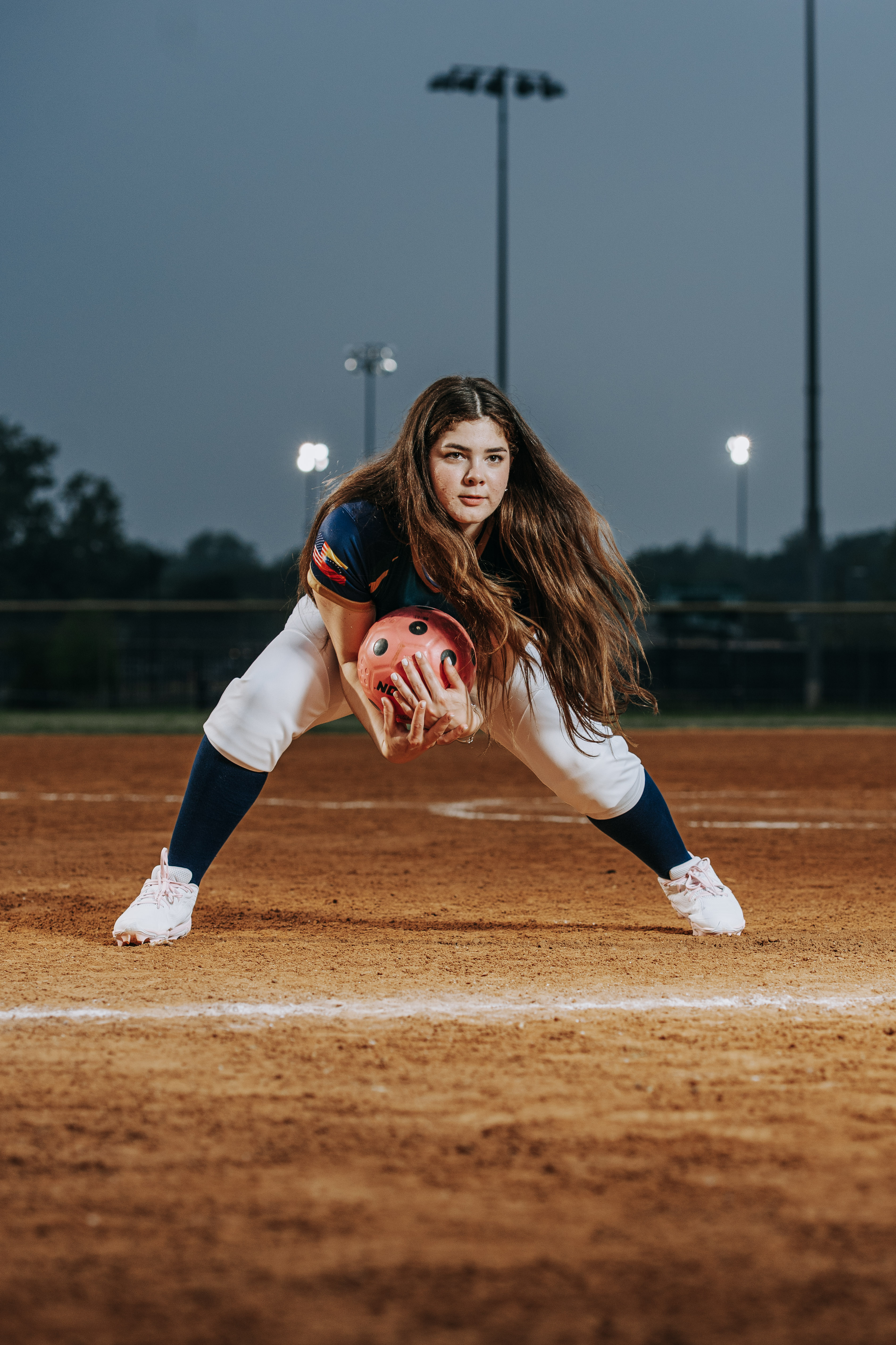 Softball athlete individual portrait night photography